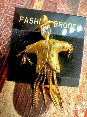 Gold Scarecrow Fringe Brooch with Rhinestone Detail by Pauline Rader